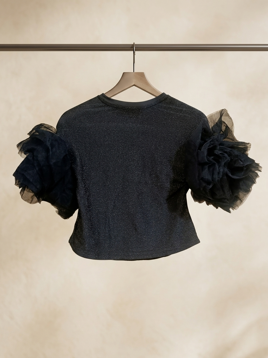 بلوز مجلسی لمه مشکی با آستینهای حجیم توری – Black Shimmer Top with Dramatic Tulle Ruffle Sleeves